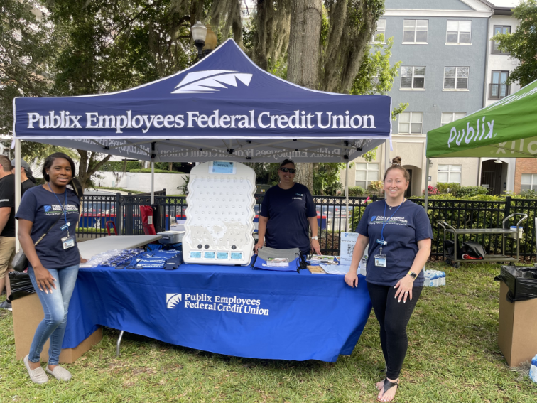 Pefcu Group at a booth